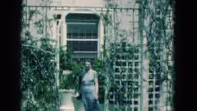 Florida USA (1975): Senior Woman And Man On A Windy Day Near A Vintage Building
