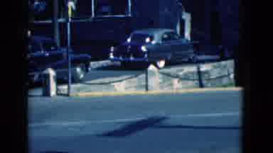 Florida USA (1975): Line Of Cars Pulling Into A Parking Lot Of One Of The Oldest