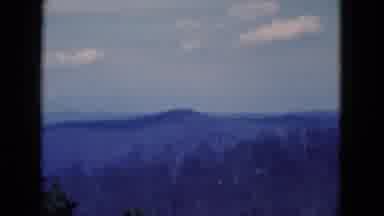 Florida USA (1975): A View Of A Bridge And Mountain Peaks
