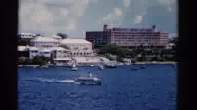 Florida USA (1975): Silver Object Churns Through Blue Lake Water On A Bright Sunny