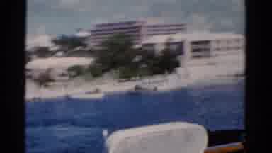Florida USA (1975): Camera Shakingly Shows Off A Resort On The Water And Clock