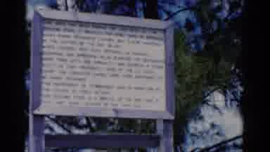 Florida USA (1975): Wooden Sign In Front Of Green Trees On A Sunny Day