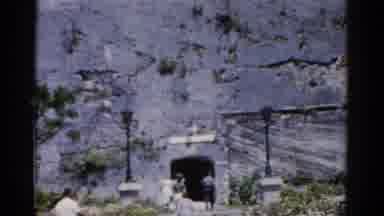 Florida USA (1975): People Entering Arched Doorway In Large Rock Face With