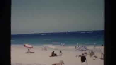Florida USA (1975): Pam Of Packed Beach Goers At The Shoreline With Umbrellas And