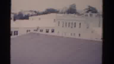 Florida USA (1975): Slowly Panning Over The Rooftops And Skyline Of A City