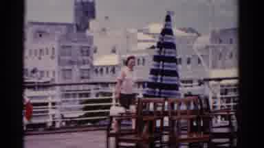 Florida USA (1975): Woman Walking Along A Boardwalk Waving