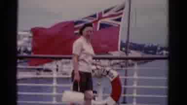Florida USA (1975): People Boarding A Ship With A British Flag Flying With Women