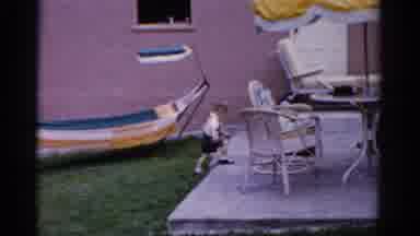 Florida USA (1975): Curious Boy Walks On Porch And Plays With Family In The