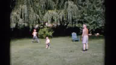 Florida USA (1975): There Are Two Children Playing Out In The Yard Being