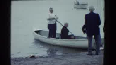 Boston Mass USA (1975): Men Getting Into A Boat