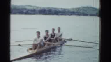 Boston Mass USA (1975): Four Men Preparing To Row A Boat On A Small Lake