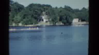 Boston Mass USA (1975): Teams Of Rowers Swiftly Rowing Across The Calm Waters Of A