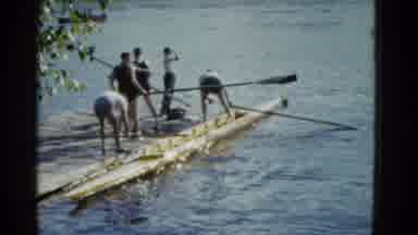 Boston Mass USA (1975): Young Adults On A River Dock Setting Up A Canoe With Oars