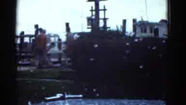 Boston Mass USA (1975): A Group Of Sea Men Stand Together And Talk As Others Walk