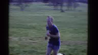 Boston Mass USA (1975): Men Running In A Marathon And Running In A Park