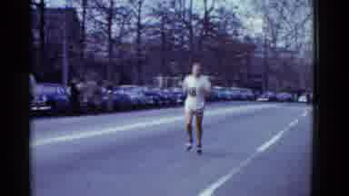 Boston Mass USA (1975): Two Person Running Marathon One Is Number Eighteen Other
