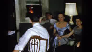 Boston Mass USA (1975): Man Wearing White Shirt With Red Tie Talking To People At