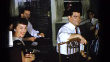 Boston Mass USA (1975): People Sitting Around Watching And Laughing At Something