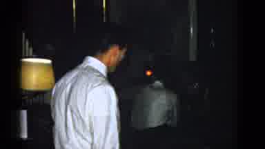 Boston Mass USA (1975): Awkward Man Walks Forward Slightly Then Backwards While