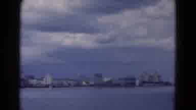 Florida USA (1975): Woman Walks Through Garden Tucked In The Cityscape Near The