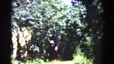 Florida USA (1975): Well Dressed Woman Walks Towards Down The Path While Wearing
