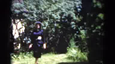Florida USA (1975): A Lady Walking Through The Field And Talking To Someone