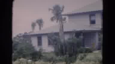 Florida USA (1975): Woman Walks Across The Lawn To Greet The Camera And Talk To It