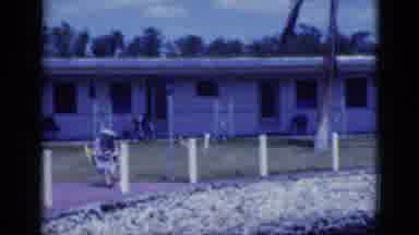 Florida USA (1975): People Sitting In Yellow Pool Furniture On A Bright Sunny Day