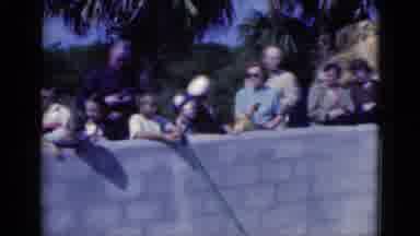 Florida USA (1975): A Mix Of Men Women And Children Standing On A Wall Or Bridge