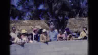Florida USA (1975): People Stand Along Concrete Barrier While Girl Wearing Pink