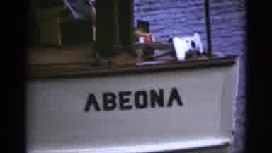 Florida USA (1975): Man On A Boat Named Abeona Cruises Near Coastal Mansions