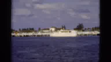 Florida USA (1975): Sunny Day With Clouds Over A Dock Near Calm Blue Water