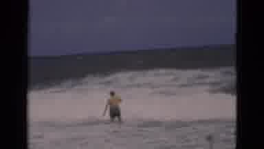 Florida USA (1975): Man Is Playing With Waves In Sea And Wave Are Continues