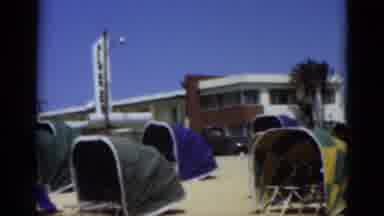Florida USA (1975): Strange Looking Tents Provide Shade On The Beach Instead Of