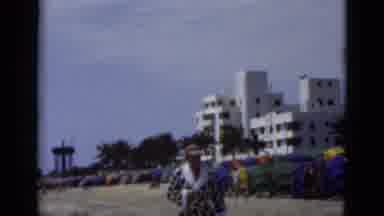 Florida USA (1975): A Man In His Robe Walking On The Beach