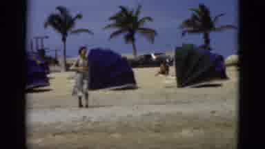 Florida USA (1975): Many People Walking And Enjoying A Hot Day On The Beach