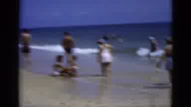 Florida USA (1975): Men Women And Children Enjoy The Beach On The A Sunny Day