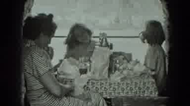 West Germany (1951): Woman And Three Girls Eating Meal At Table By Window In