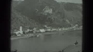 West Germany (1951): Wide Shot Of A Shoreline Village