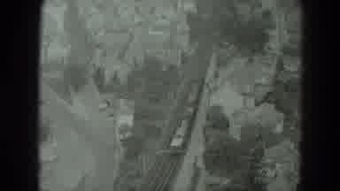 West Germany (1951): View Of Train Traveling On Tracks On A Cloudy Day