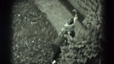 West Germany (1951): A Girl Pushing Out A Boy Out Of The Yard While Boy Throws