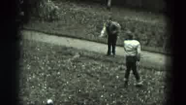 West Germany (1951): Two Boys Play With White Ball Girl Watches Then Pushes Boy