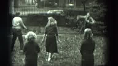 West Germany (1951): Woman Climbing Fence