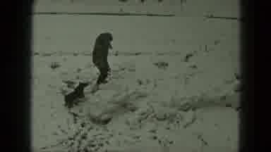 West Germany (1951): A Person Dressed In Winter Clothing And Holding A Snowball