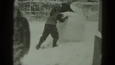 West Germany (1951): Children Play Snowballing Outdoors On A Typical Winter Day
