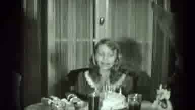 West Germany (1951): Girl Jumping Up And Down With Excitement At A Birthday Party