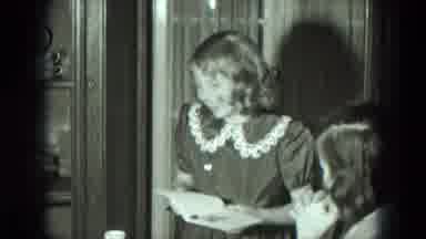 West Germany (1951): Girl Opens Card Then Sits Down To Read