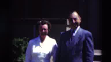 Paducah Kentucky USA (1951): Nurse Walks With Man Wearing Blue Suit On A Bright
