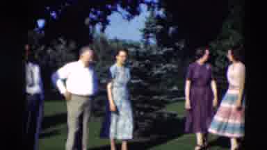 Paducah Kentucky USA (1951): Men And Women Enjoy A Beautiful Sunny Day Among