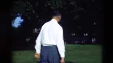 Paducah Kentucky USA (1951): Man In A White Button Up Shirt And Tie Slowly Walking